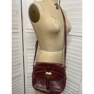 Dooney & Bourke Heart Buckle Leather Flap Saddle Bag Crossbody in Red
